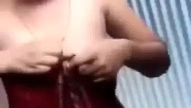 Slutty teen gal exposes perky Desi tits and cute twat in XXX clip