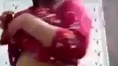 Sexy girl shows her boobs and ass to striptease her BF