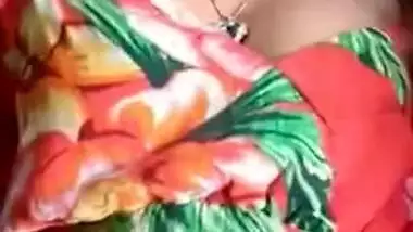 Staggering Desi porn girl in floral dress climbs the glass table