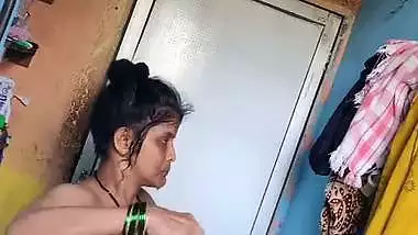 Perverted neighbor records a desi milf bathing in her bathroom