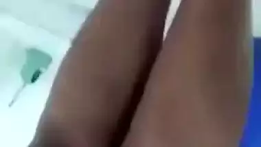 Beautiful desi girl lifting top to reveal sexy boobs